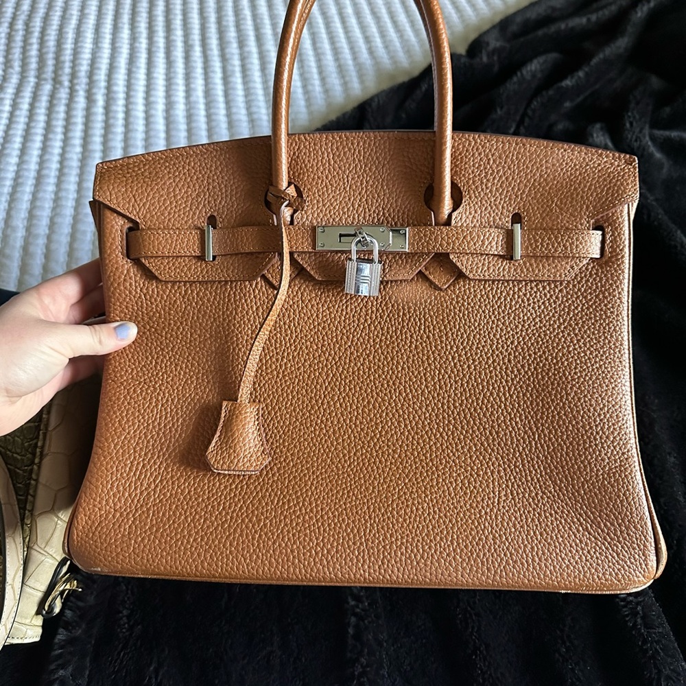 Brown bag with key and lock